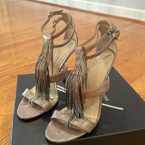 Brian Atwood metallic heels with fringe. Original box included.
